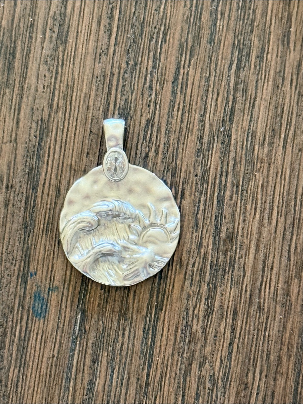 Silver Sun and Wave Round Pendant - Silver tone clear oval gemstone